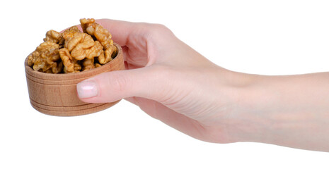 Wall Mural - Wooden bowl with walnuts healthy food in hand on white background isolation