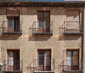 Wall Mural - A Segovian facade decorated with, Sgraffito, an architectural ornamental technique of roman origin used to decorate the plastering and covering of walls. Segovia, Spain.