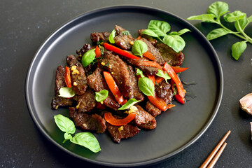 Wall Mural - Thai beef stir-fry with pepper and basil