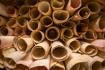 Poster - Scribe library. Retro futhpak scrolls stacked on a pile.