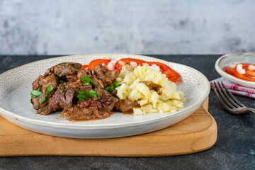 Canvas Print - Chicken liver and chorizo in creamy sauce