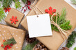 © katrinshine - Christmas present with square blank gift tag top view, Mockup