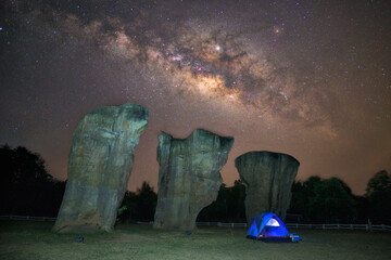 milky way with bright stars on blue sky at night at SNational Park, Chaiyaphum Province
, Thailand. Natural universe space landscape background. It is the galaxy. Astronomy landscape.