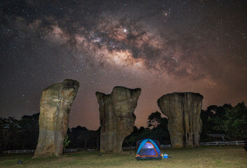 milky way with bright stars on blue sky at night at SNational Park, Chaiyaphum Province
, Thailand. Natural universe space landscape background. It is the galaxy. Astronomy landscape.