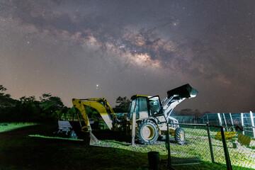 milky way with bright stars on blue sky at night at Phu Kradueng mountain hills, Thailand. Natural universe space landscape background. It is the galaxy. Astronomy landscape.