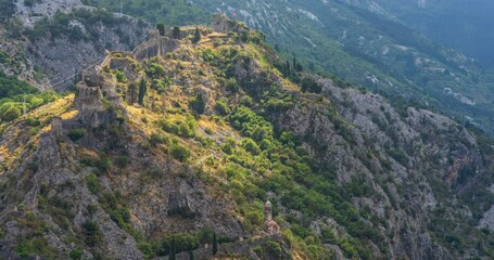 Wall Mural - View at sunset of the Fortress of St. John (San Giovanni), Old Town, Kotor, Bay of Kotor, Montenegro