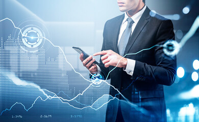 Poster - Businessman wearing formal suit is typing message on smartphone