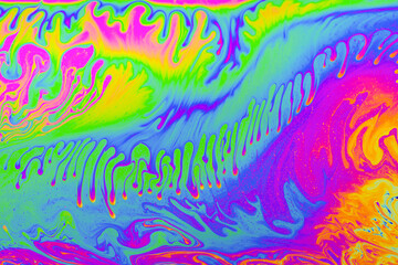 Wall Mural - psychedelic multicolored background abstract. rainbow colors. patterns background. photo macro shot 