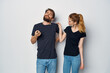 © SHOTPRIME STUDIO - married couple in black t-shirt sunglasses posing studio lifestyle