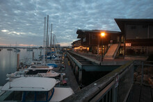 The Morro Bay Waterfront With Restaurants And An Outside Dining Area