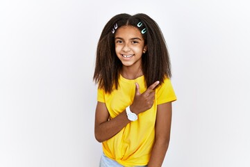 Wall Mural - Young african american girl standing over white isolated background cheerful with a smile of face pointing with hand and finger up to the side with happy and natural expression on face