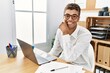 © Krakenimages.com - Young hispanic man working with laptop at business office