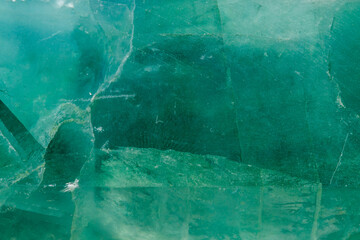 Wall Mural - Macro mineral stone Fluorite crystal on a black background