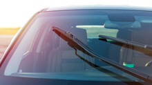 Car Windshield Brushes. Concept For Cleaning Products, Polishing, Anti-rain