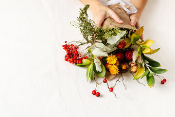 Wall Mural - Handmade autumn bouquet with dry plants, grass