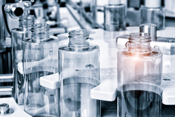 Poster - pharmaceutical industry, medicine pills are filling in the  bottle on production line machine conveyor at the medical factory. selective focus.