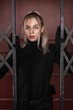 © Demian - Noir film. Hit woman in a black.