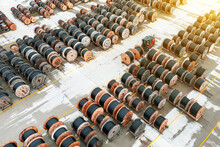 A Huge Number Of Wooden Coils With Polypropylene Pipes. Production And Storage Of Polypropylene Pipes For Urban Communications. View From Above