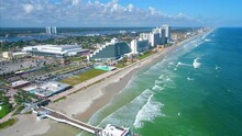Drone Flying Away From Daytona Beach Shore Revealing Coastline Vista