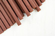Cigarettes in brown paper on a white background close-up. Top view