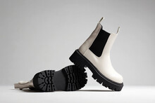 White Trendy Boots. Fashion Female Shoes Still Life