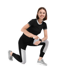 Wall Mural - Sporty young woman checking pulse on white background
