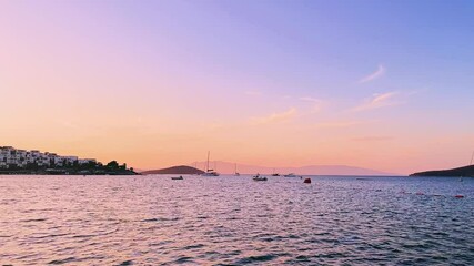 Wall Mural - Seaside landscape at sunset, sea and mountains in summer, travel destination, beach getaway and summertime holiday b-roll. High quality 4k footage