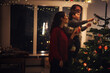 © Jacob Lund - Family decorating home for Christmas