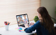 © vectorfusionart - Caucasian girl using laptop for video call, with smiling diverse high school pupils on screen