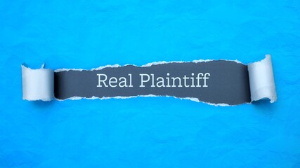 Wall Mural - Real Plaintiff. Blue torn paper banner with text label. Word in gray hole.