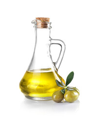 Wall Mural - Green olives and olive oil pitcher isolated on white.