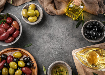Canvas Print - Virgin olive oil, olives and fresh bread on the table. Top view