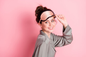 Poster - Profile side photo of young girl happy positive smile hand touch sleeping mask isolated over pastel color background