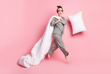 Poster - Full size of carefree crazy person fall cushion hands hold blanket have fun isolated on pink color background