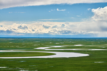 Wall Mural - There are many twists and turnss in Bayanbulak grassland scenic spot Xinjiang Uygur Autonomous Region