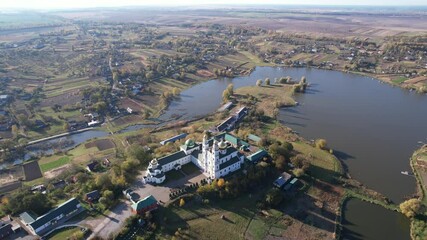 Wall Mural - Gorodishchensky Holy Nativity of the Theotokos Monastery is an Orthodox male monastery in the name of the Nativity of the Virgin in the village of Gorodishche, Khmelnitsky region, Ukraine, aerial view