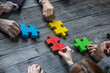 © alotofpeople - Business teamwork with color puzzle