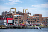 Fototapeta Nowy Jork - A view of the Brooklyn Navy Yard from the East River in New York City