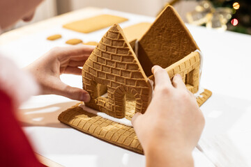assembling and decorating a gingerbread house