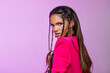 © Julia - Fashion Portrait Black Woman in Pink stylish jacket. Neon Pink Makeup. Fashion model African American posing on pink background studio.