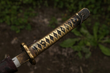 Poster - The hilt of vintage katana sword