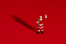 Clay Figure Santa Claus Over Red Background