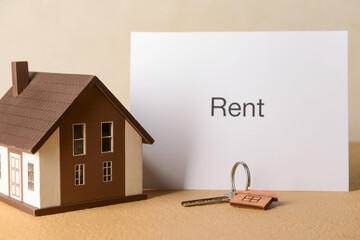 Poster - House model with word RENT and key on beige background