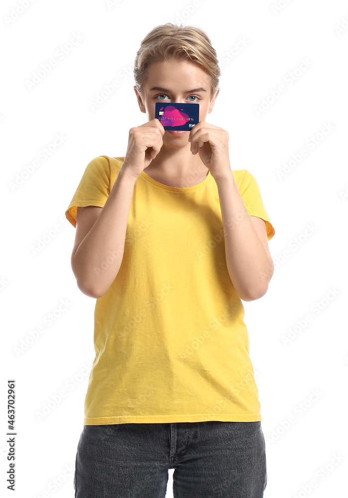 Pretty young woman with credit card on white background
