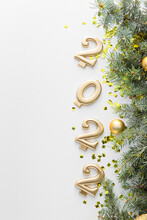 Composition With Fir Branches And Figure 2022 On White Background, Closeup