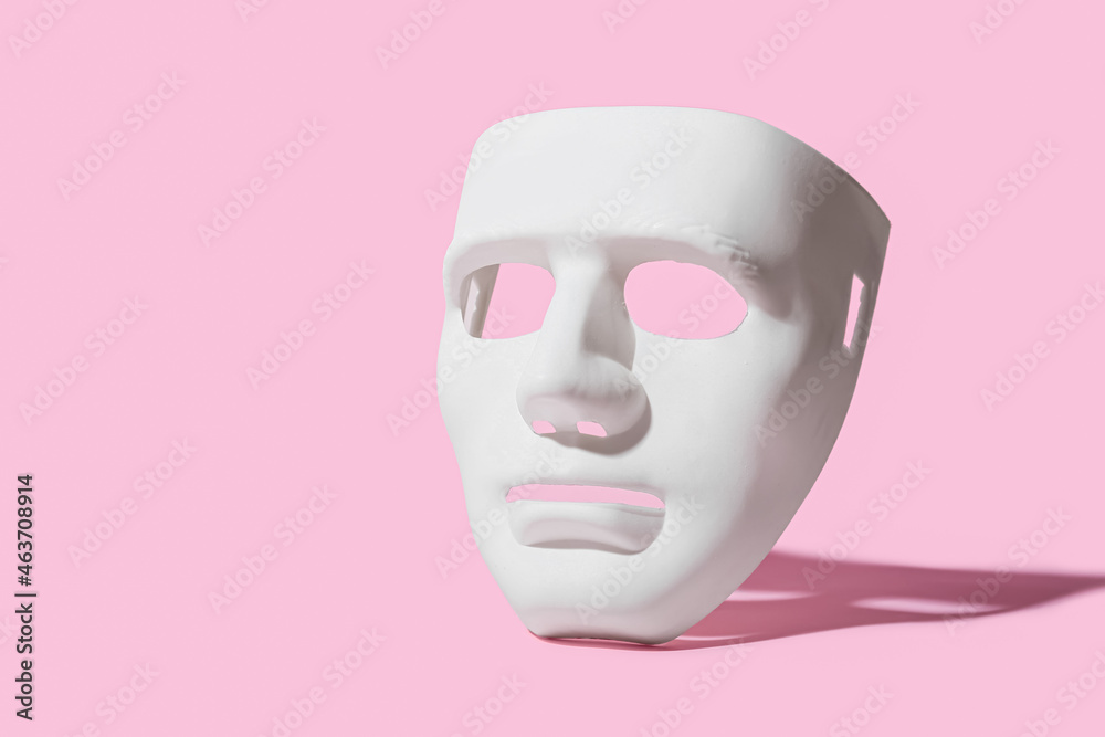 Guy Fawkes mask on color background