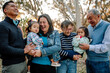 © Erin Brant/Stocksy - Joyous reunion in eucalyptus grove