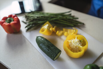 Wall Mural - Closeup of colorful vegetables on a board on the table