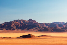 Mountains An Dunes In Desert Landscape