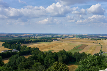 Poster - Scenic view of a rural landscape on a cloudy sky background